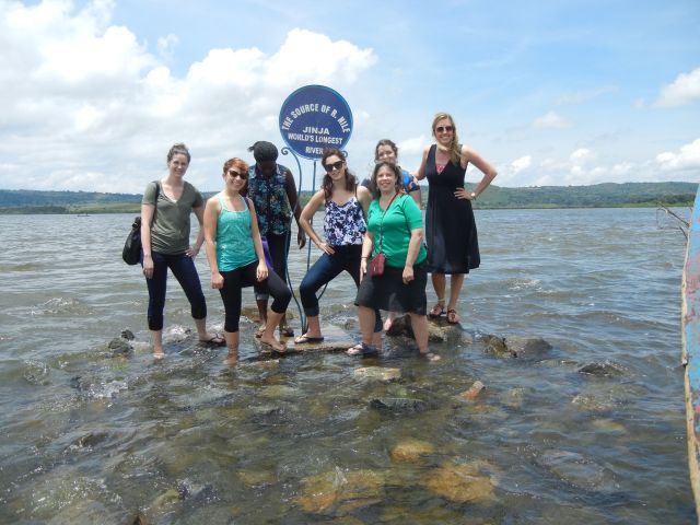 The group standing by the sign which marks the Source of the Nile, 70% of the water flows from Lake Victoria, behind us, and 30% comes from the springs bubbling up from below.  As you can see the spot is under water in this rainy season and we were all trying to brace ourselves and not fall on the slippery rocks.